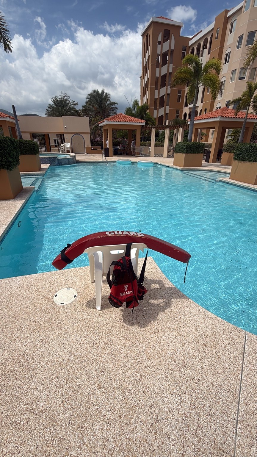 Rescue equipment next to a swimming pool